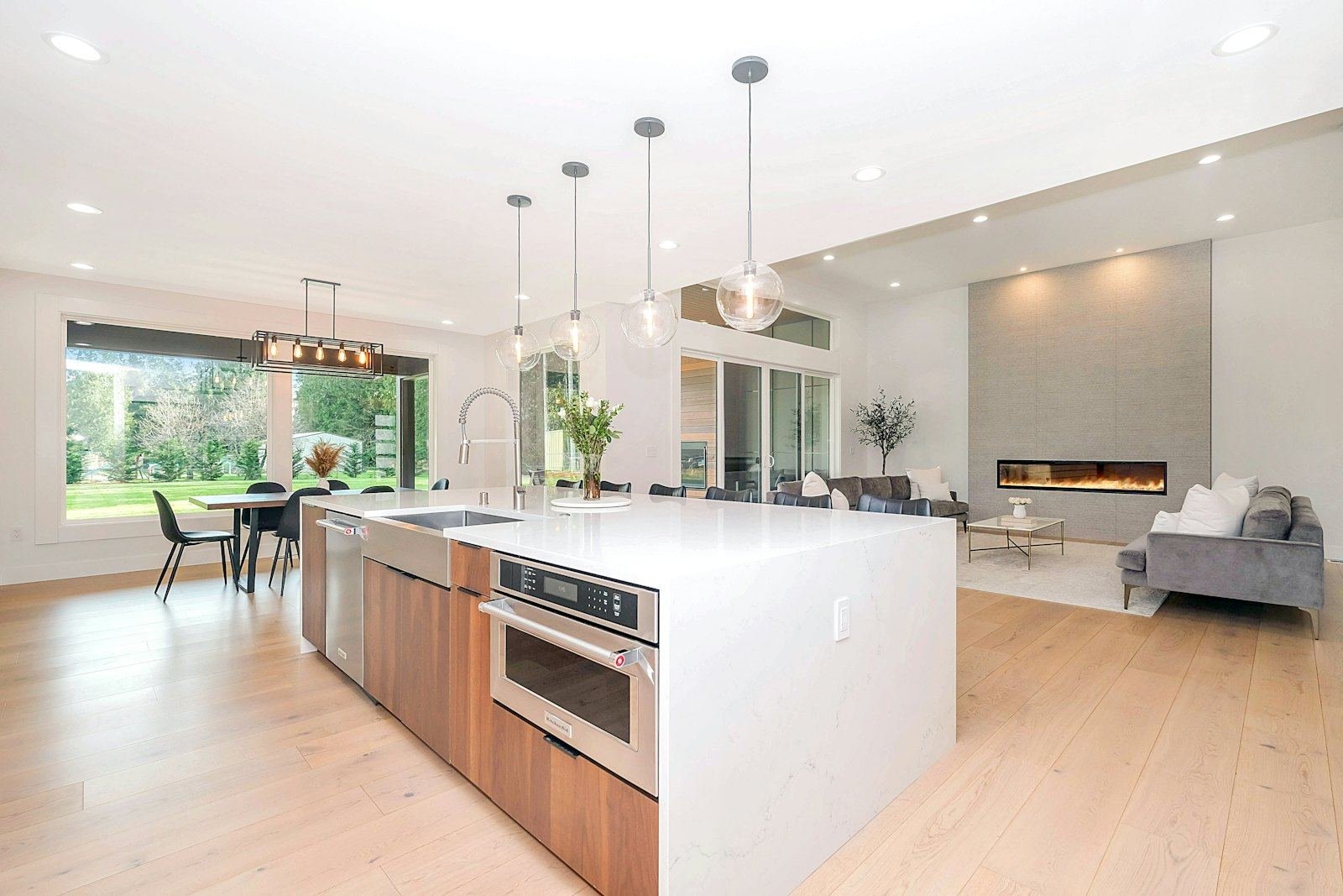 A bright, spotless kitchen counter and sink after a deep clean