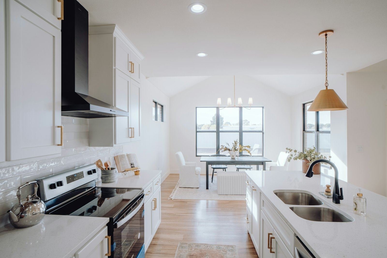 A clean kitchen with a bright window